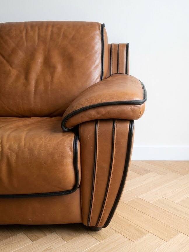 Vintage 1970s brown leather two-seater sofa