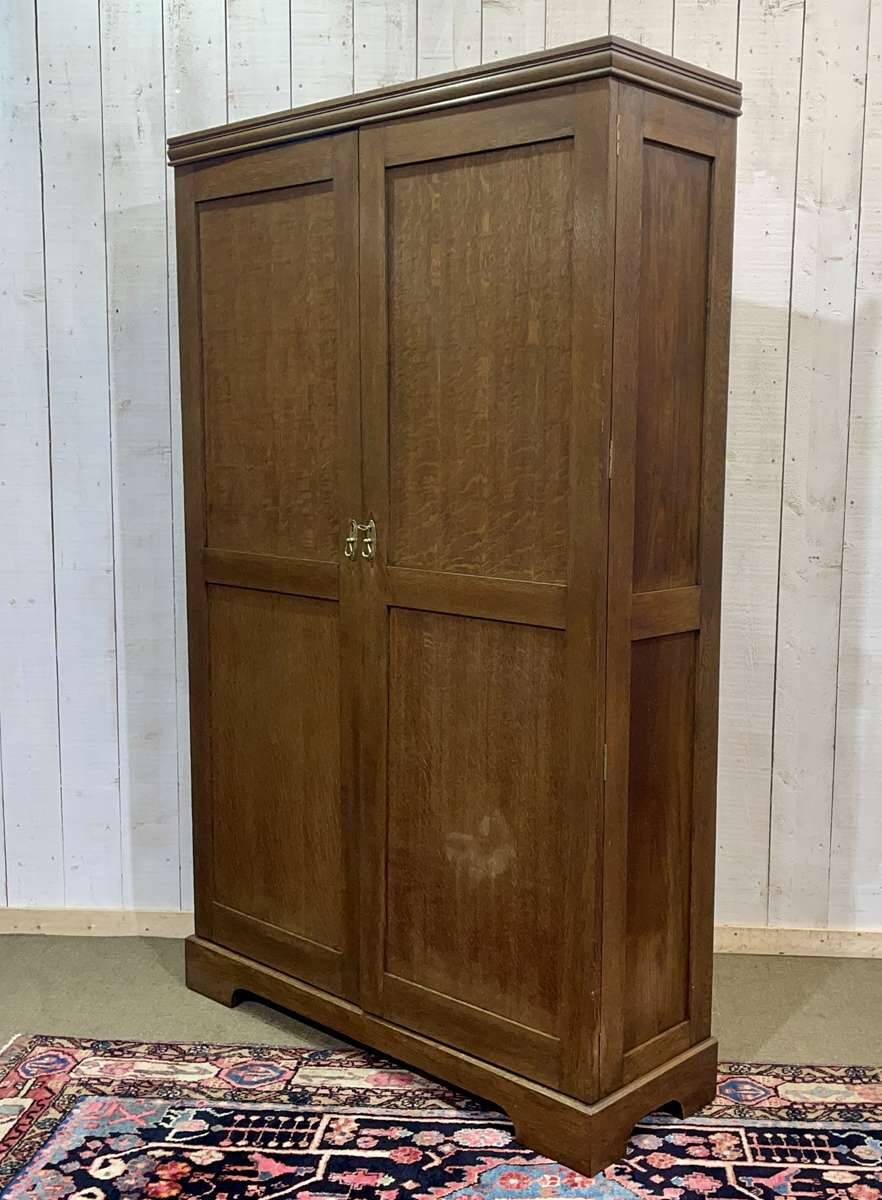 English oak wardrobe from the early 20th century.
