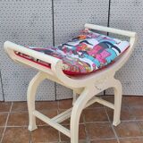 Curule stool in patinated carved wood, Manuel Canovas seat, 60 cm