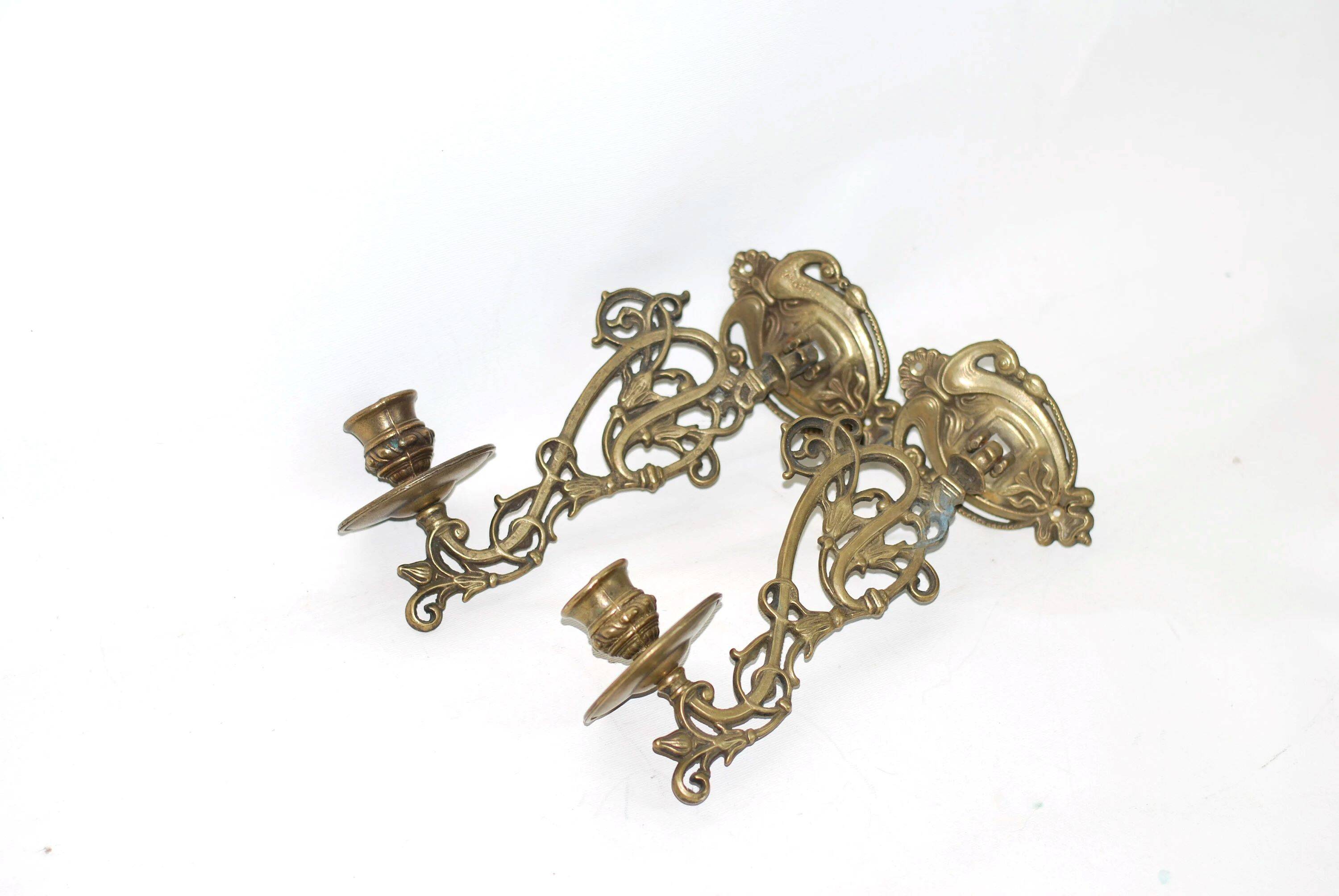 Pair of wall candle holders in brass