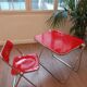 Vintage lot design – Platone table + red Plia chairs – Anonima Castelli