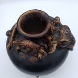 Antique Khmer ceramic vase. With elephant decoration.