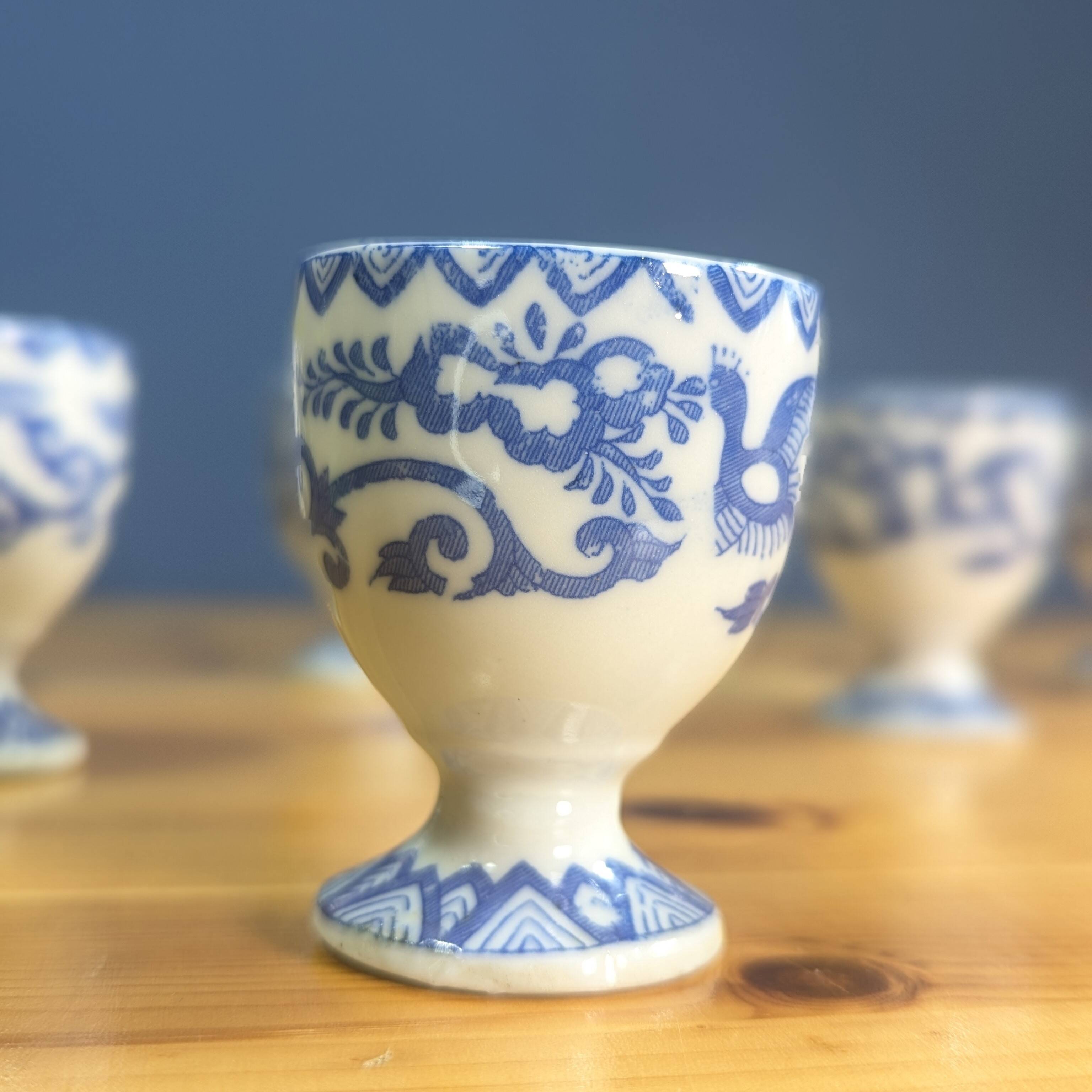 6 Japanese porcelain egg cups signed with blue bird flower geometry patterns