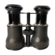 Old pair of binoculars sheathed leather black silver metal