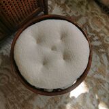 Dark rattan pouf stool with loop cushion