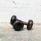 Pair of vintage cast iron and wood dumbbells