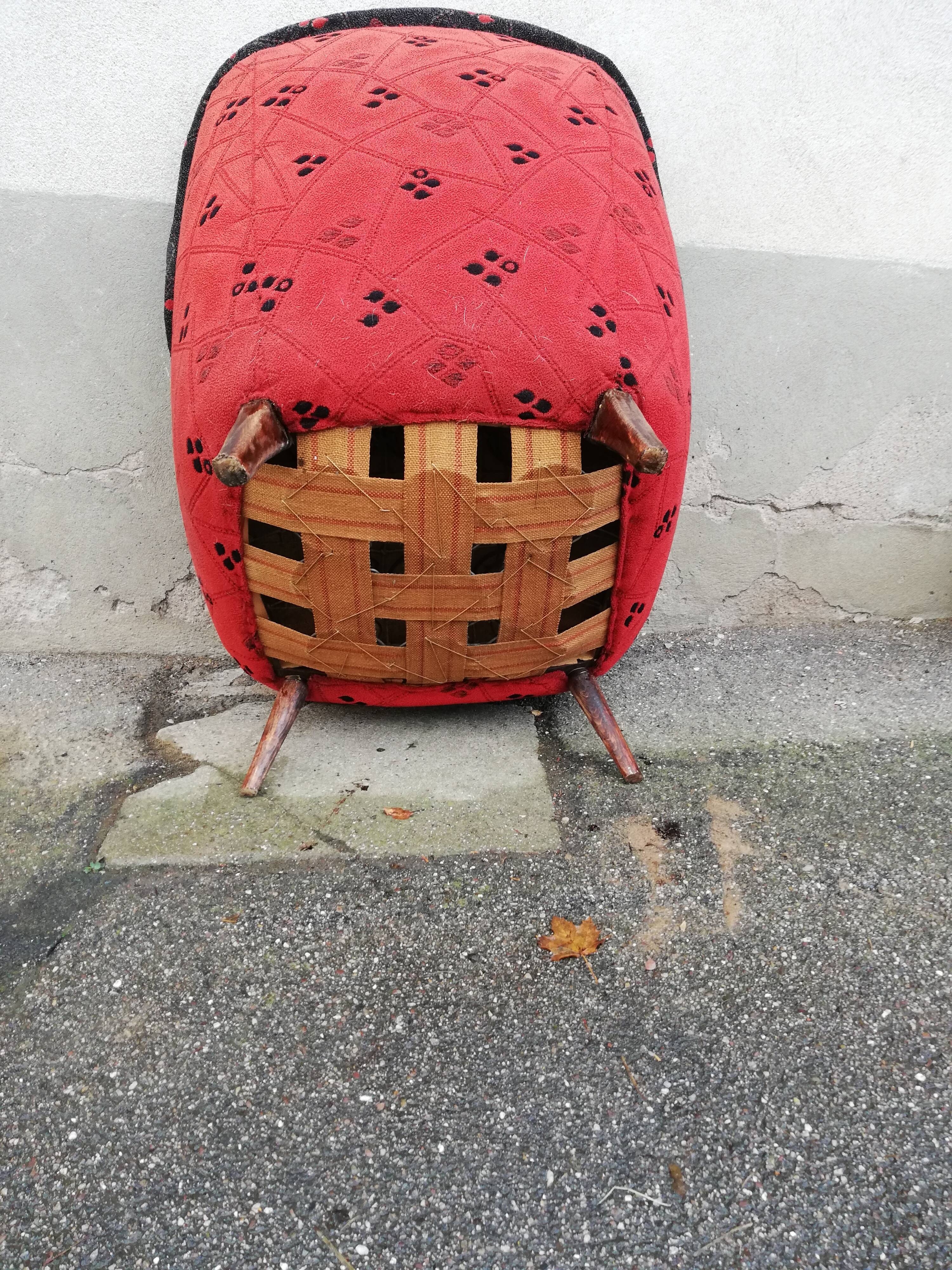 Fauteuil année 50 rouge et noir pieds compas
