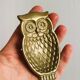 Gold metal owl pocket emptier