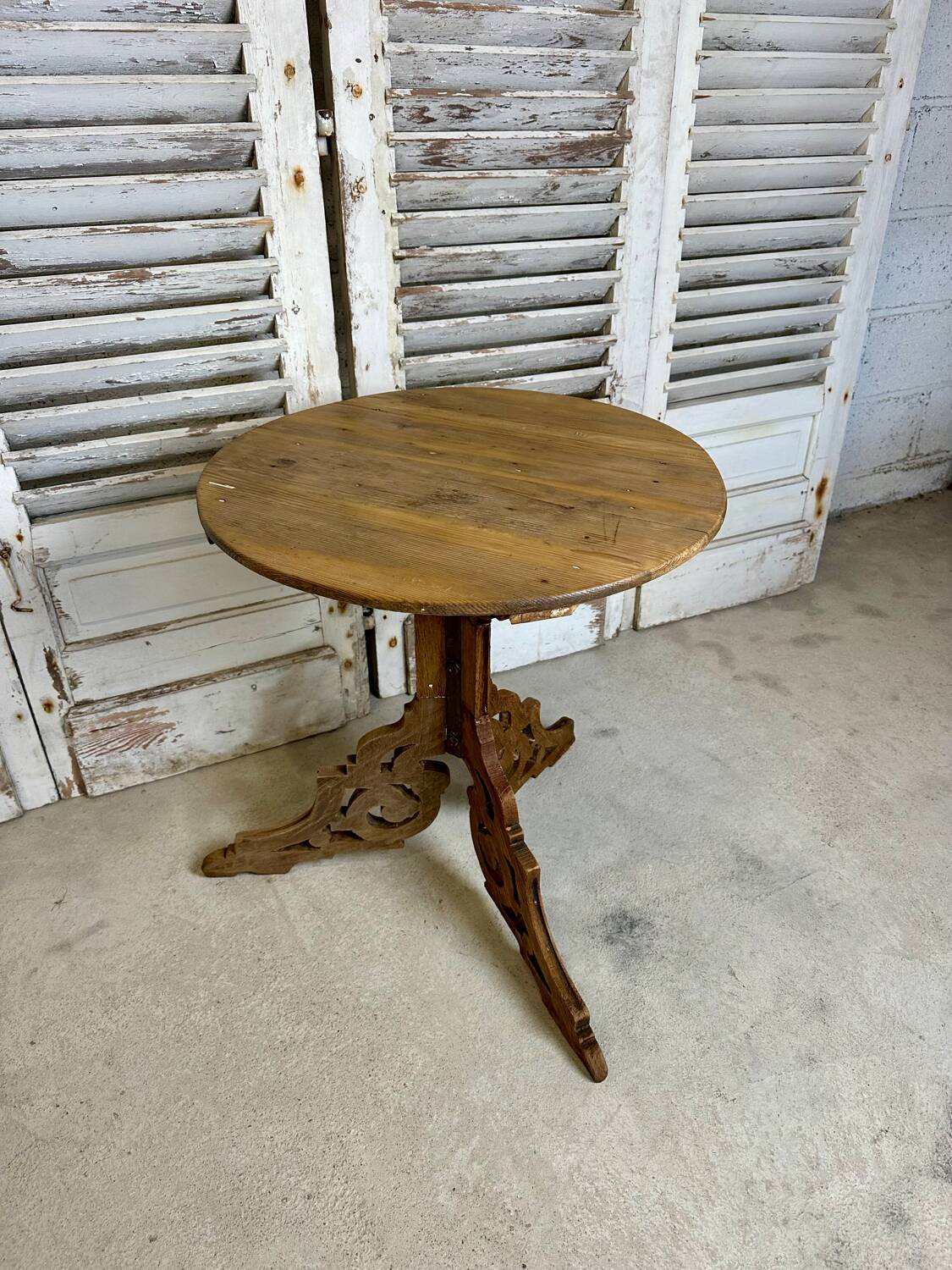 Raw wood pedestal table