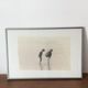 Black and white photo on fabric, framed