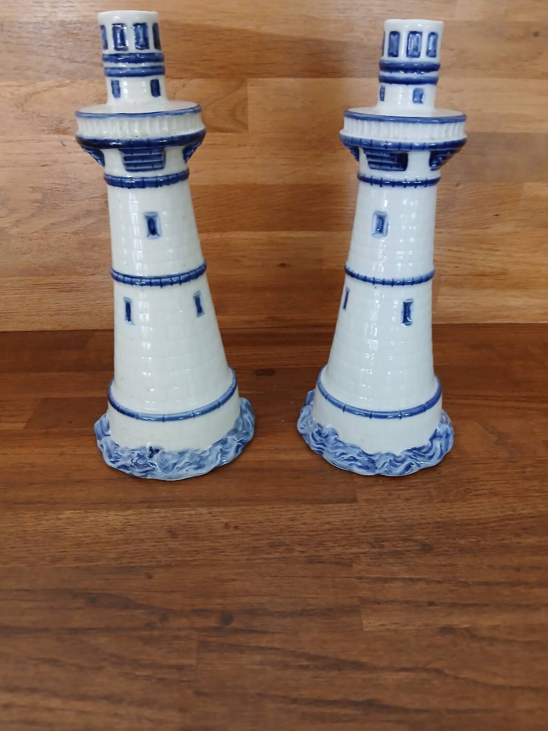 Pair of lighthouse-shaped candle holders