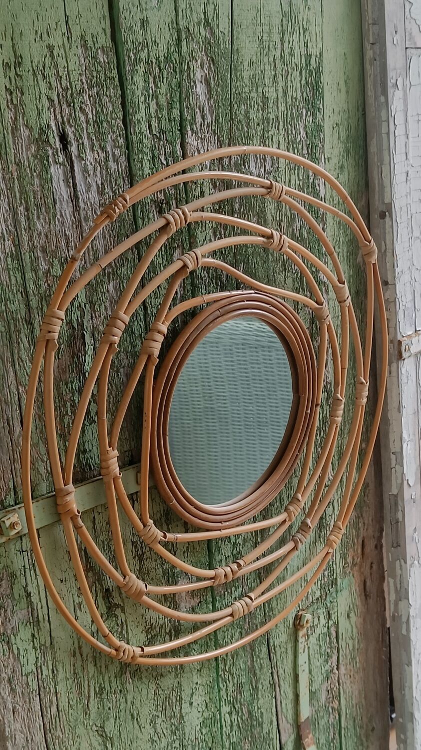 Round rattan mirror