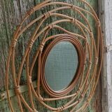 Round rattan mirror