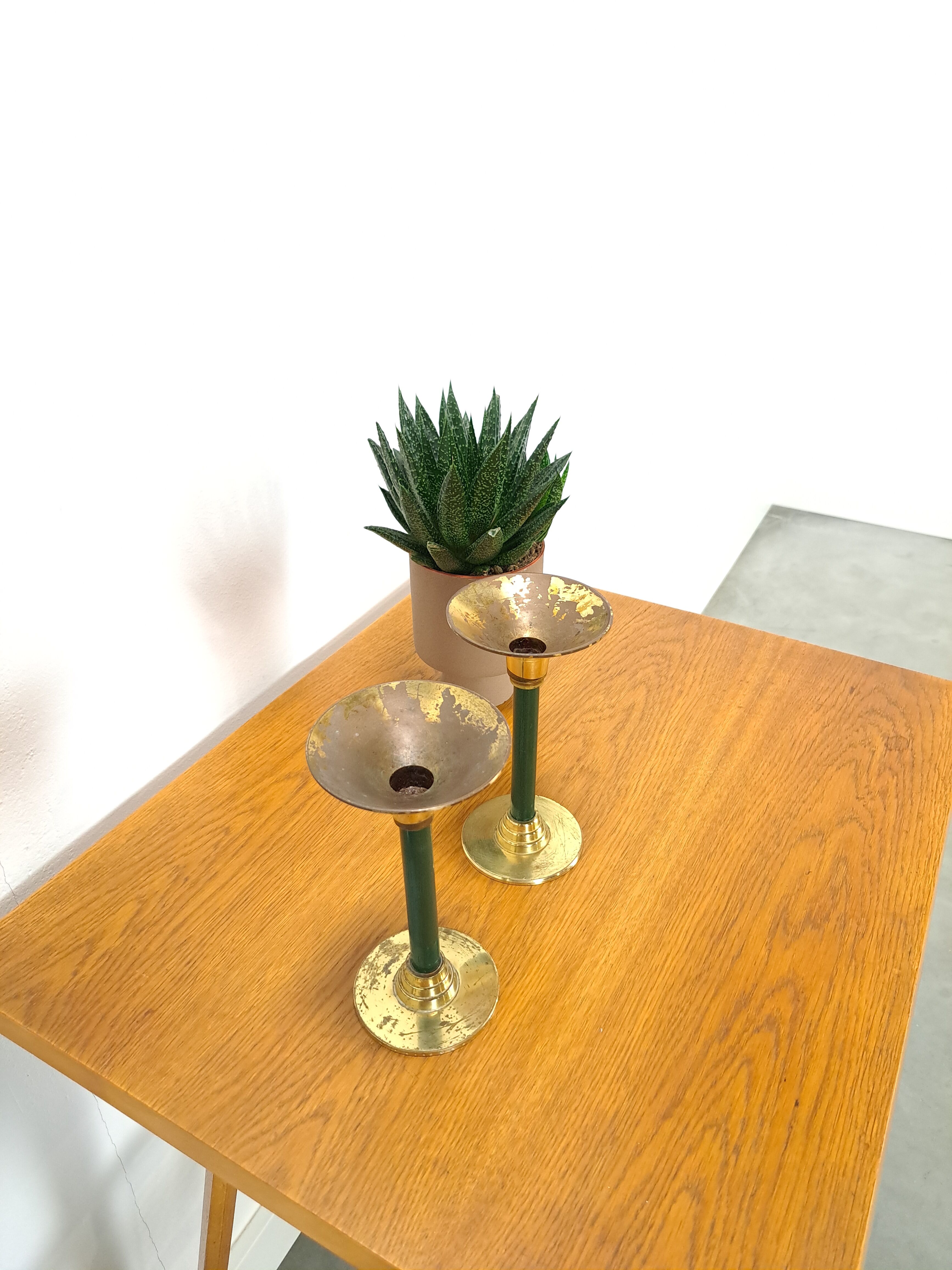Brass candlesticks with dark green vintage