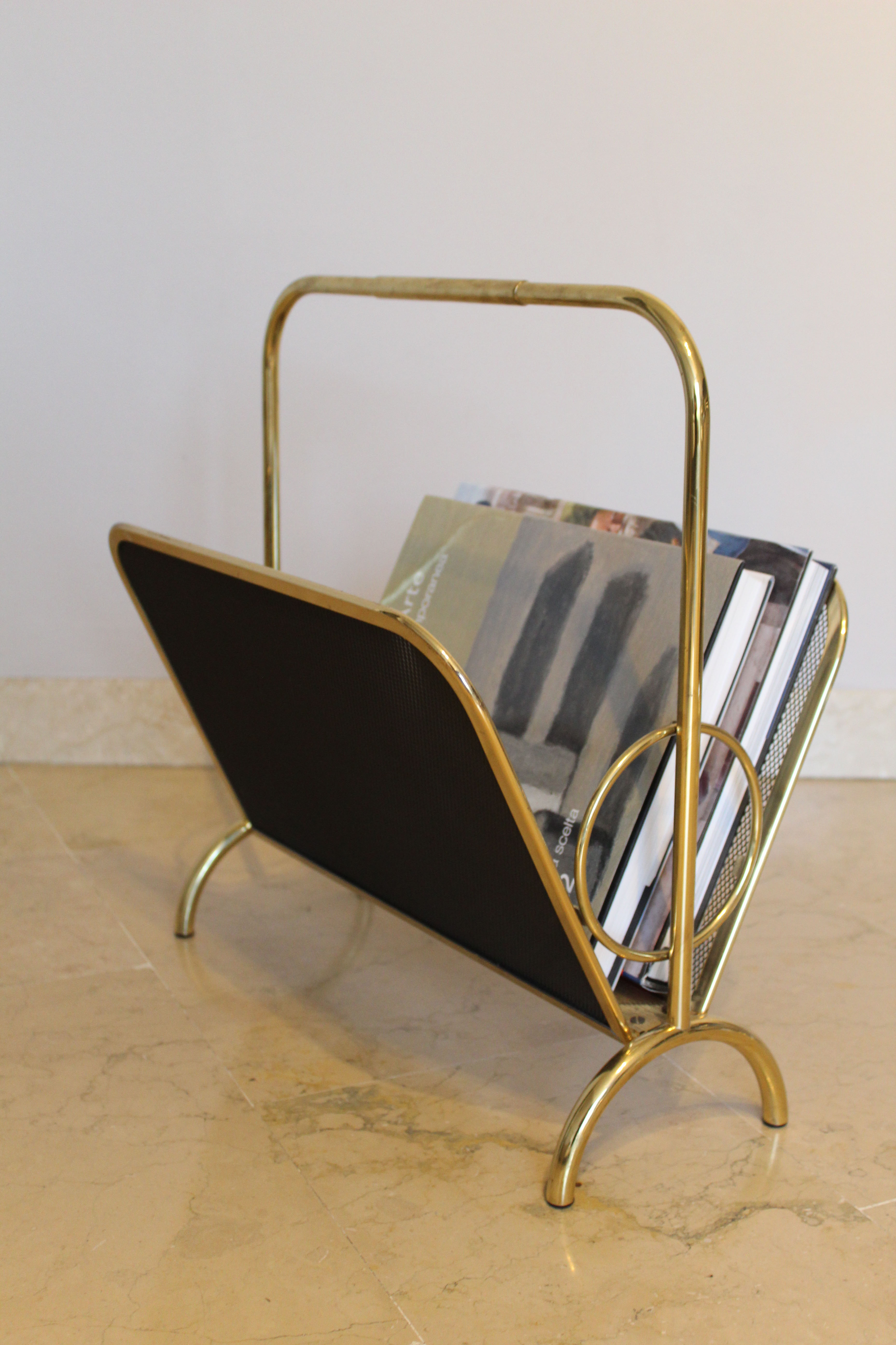 Magazine rack in brass and black lacquered metal, Italy 1970s