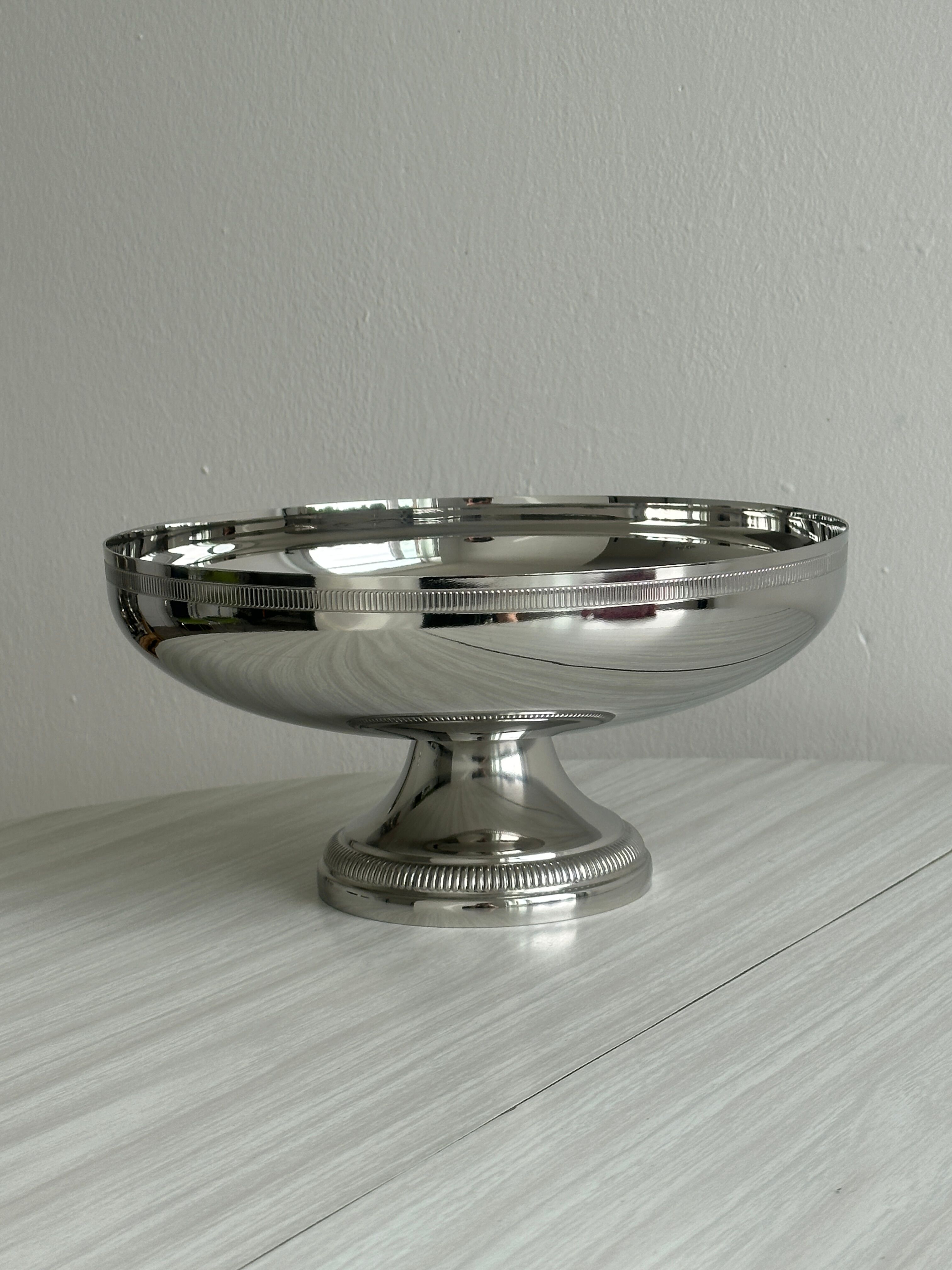 Large silver stainless steel pedestal bowl