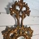 Italian mirror in gilded wood with gold leaf from the 18th century.