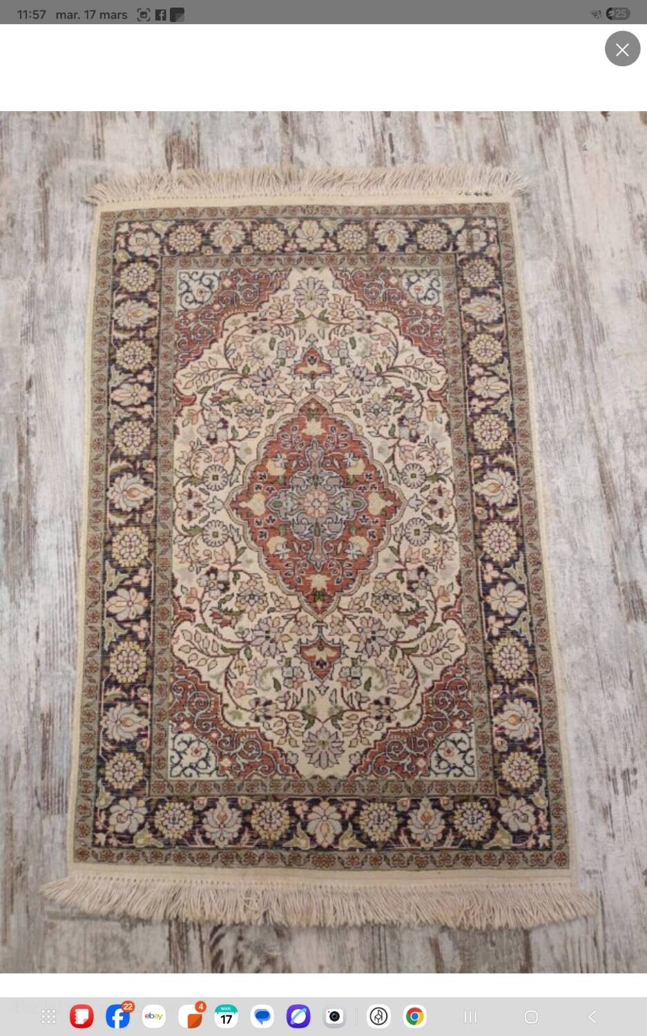 Handmade Persian carpet in wool and silk.