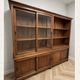 Large double-body showcase library in solid teak.