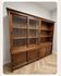 Large double-body showcase library in solid teak.