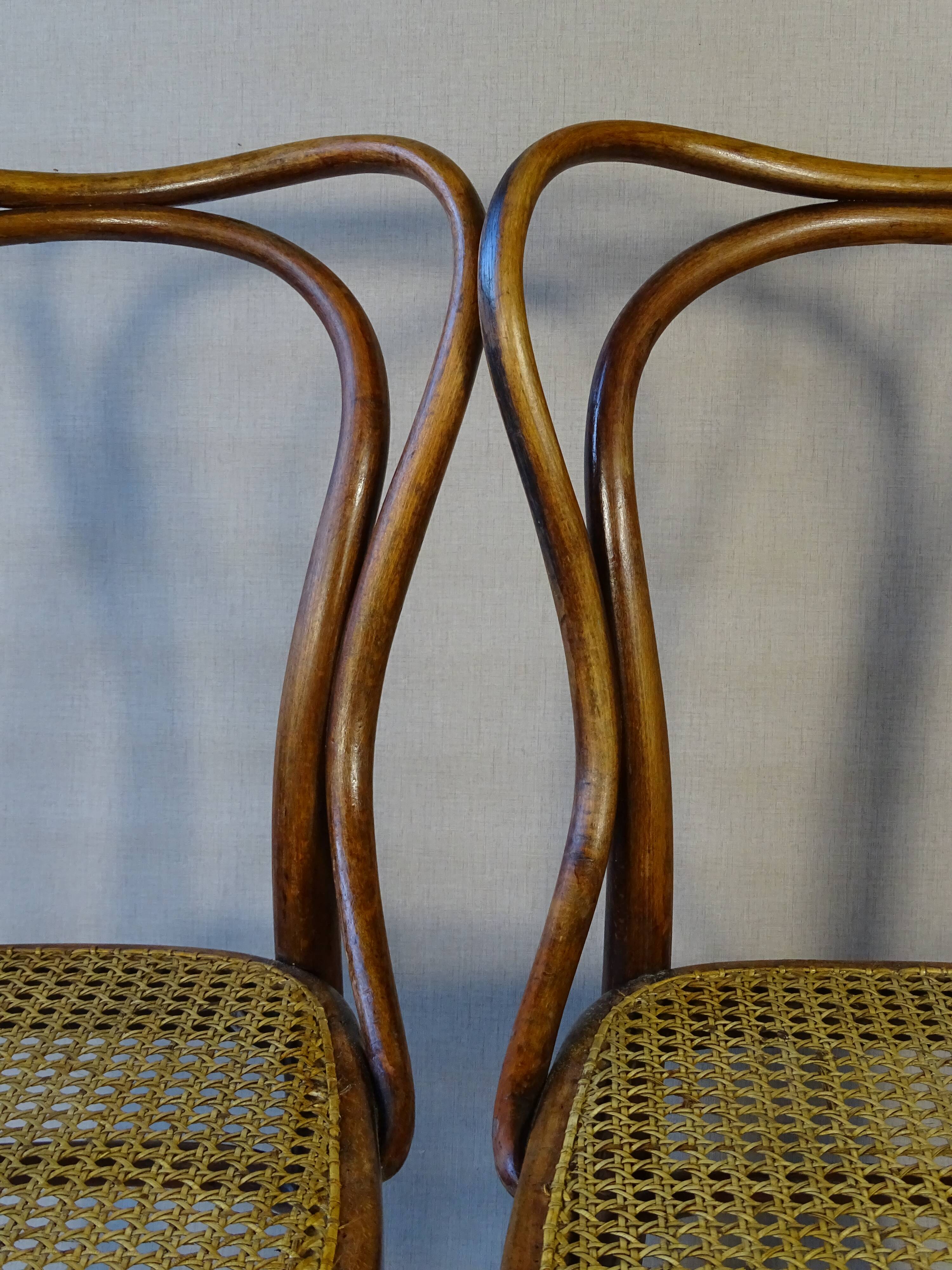 2 Bistro chairs No. 55- 3/4 by Kohn, circa 1905, caned