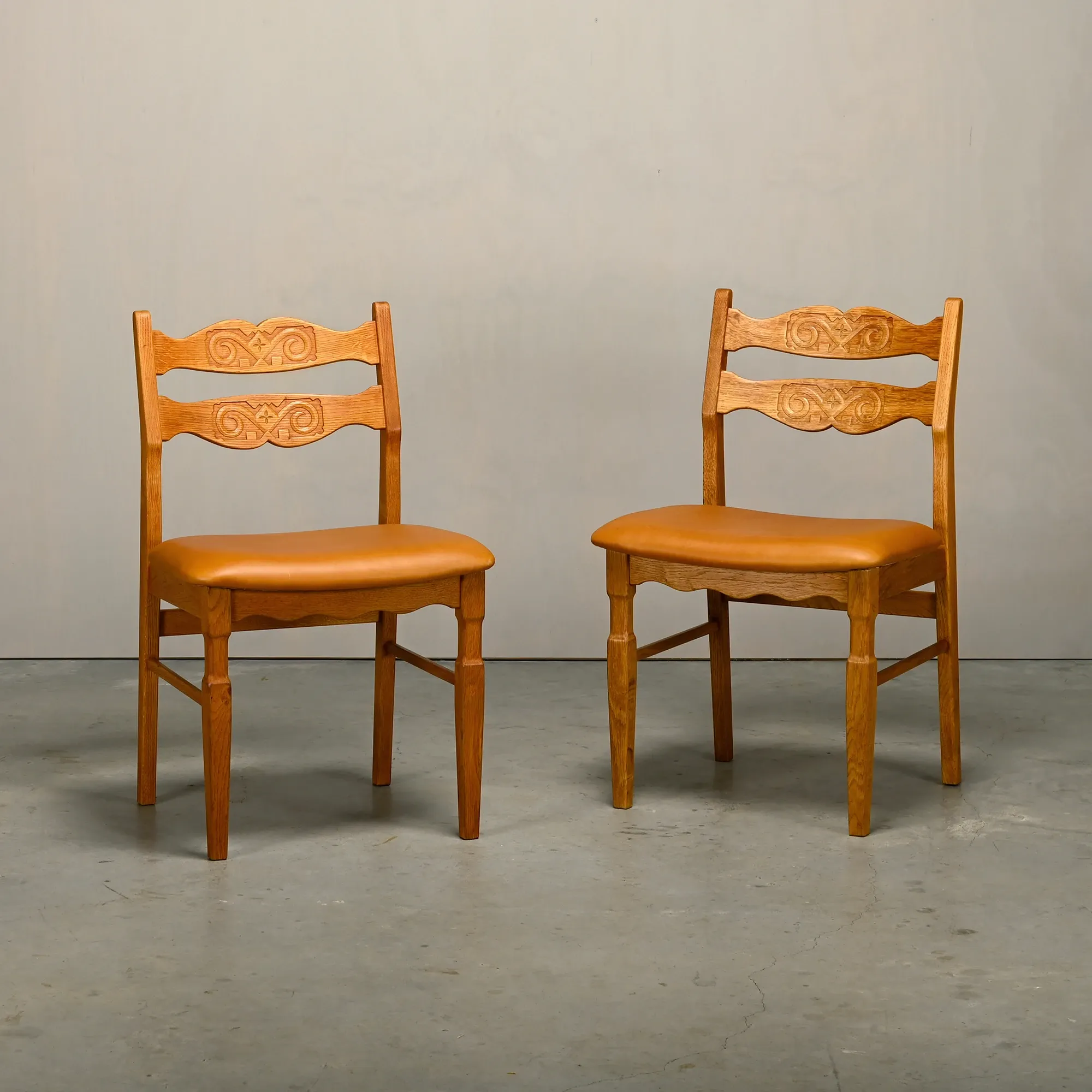 Razorblade style dining chairs by Henning Kjærnulf Oak and Leather Denmark