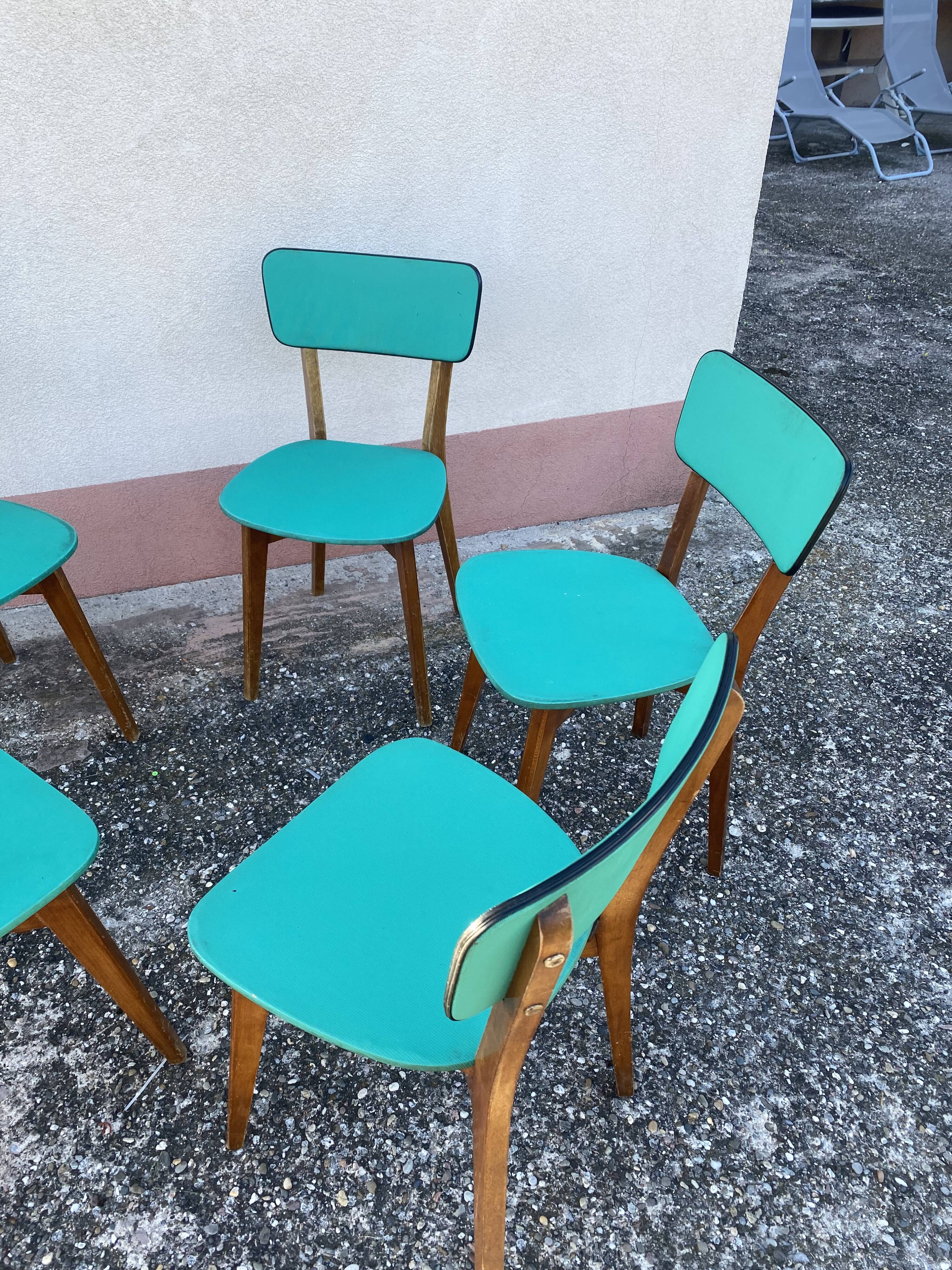 Chaises en skaï pied compas vintage bleu vert
