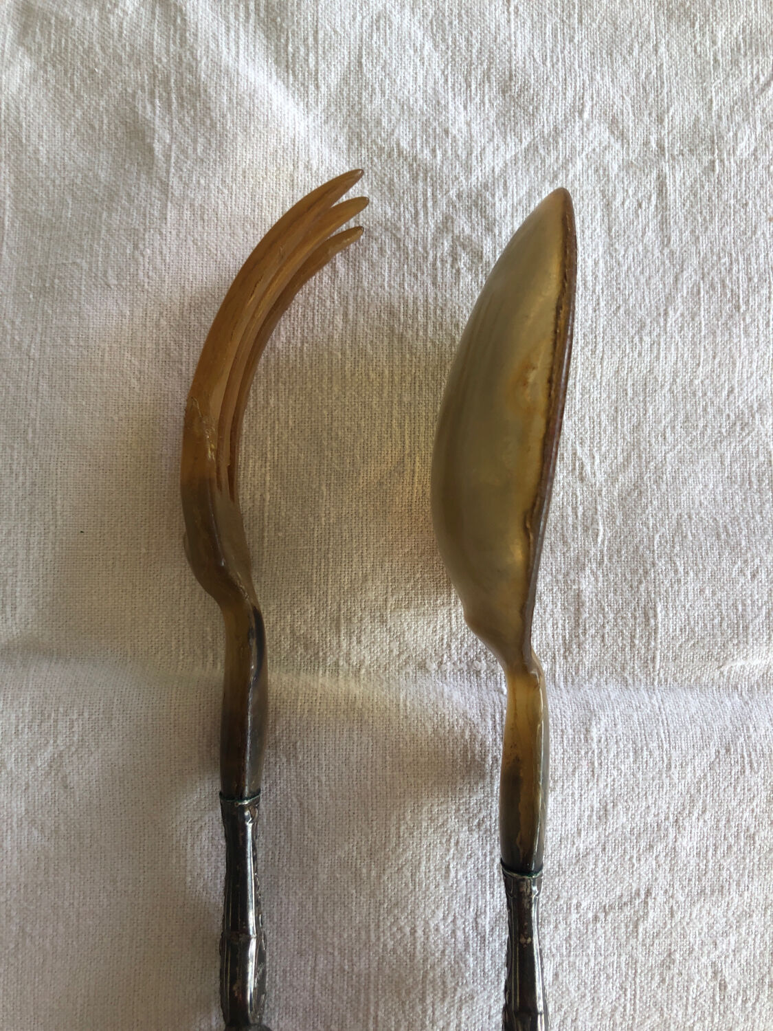 Old corn and silver salad cutlery