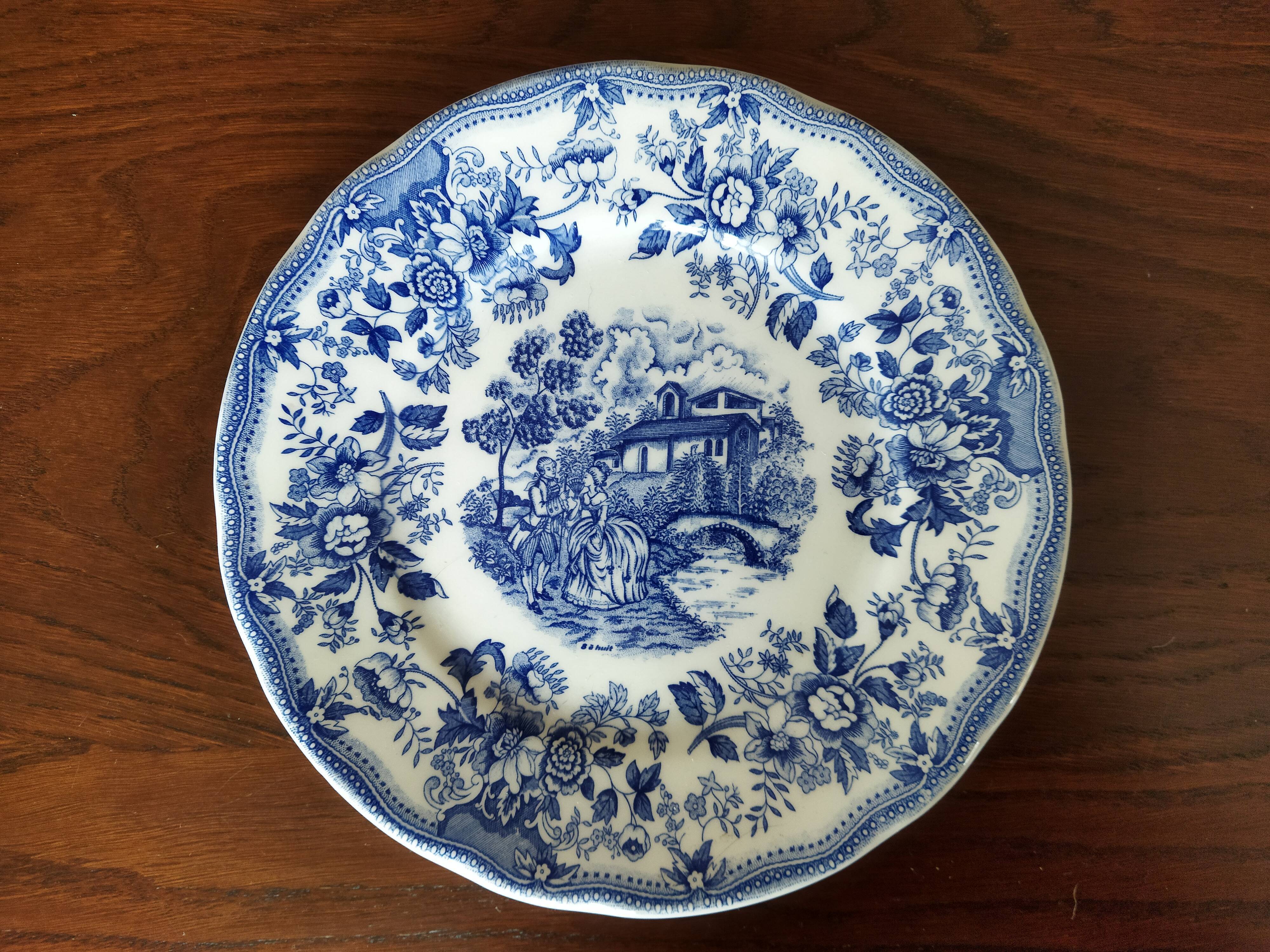 8 blue & white plates