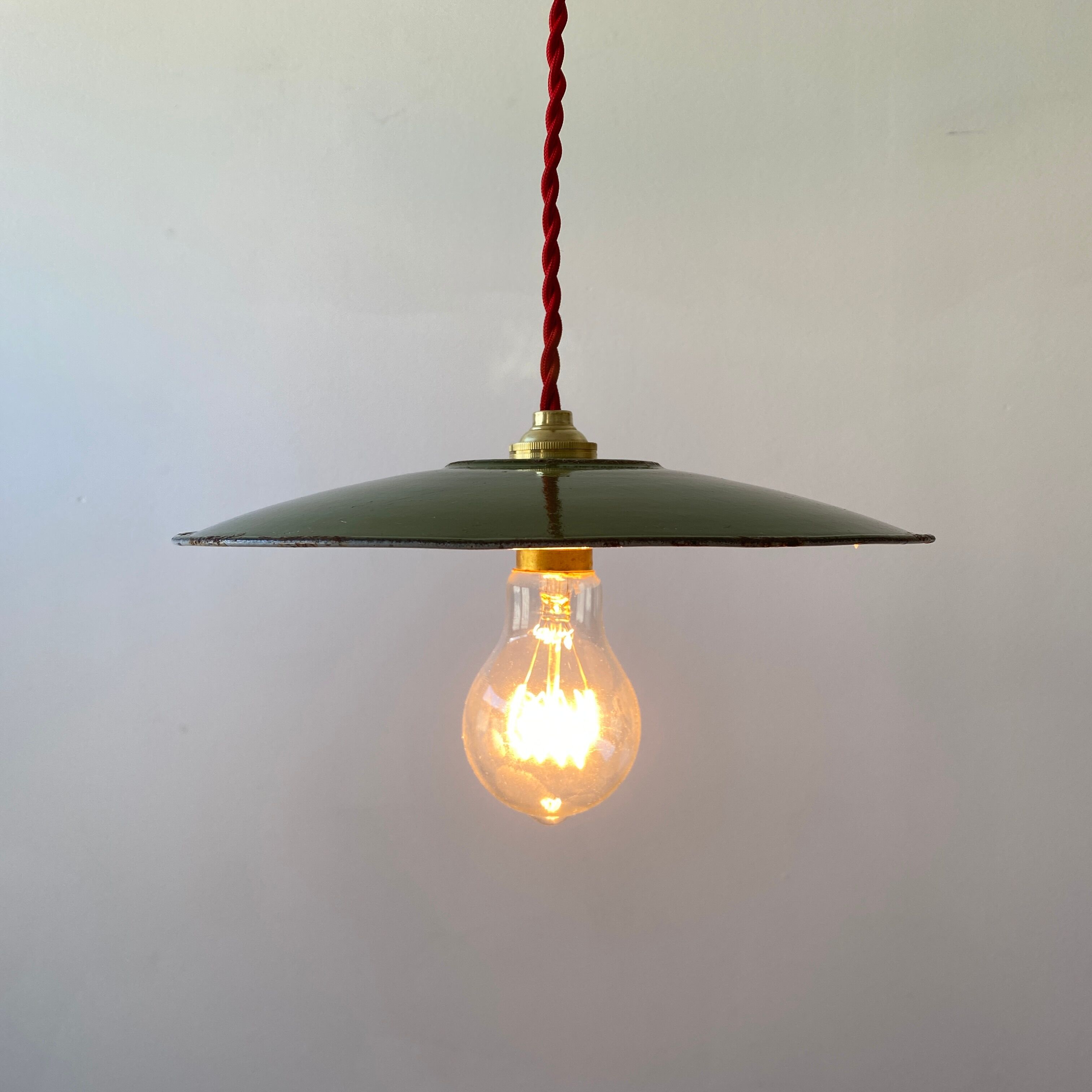 Pair of old green enamelled suspensions