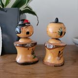 Two Kokeshi dolls