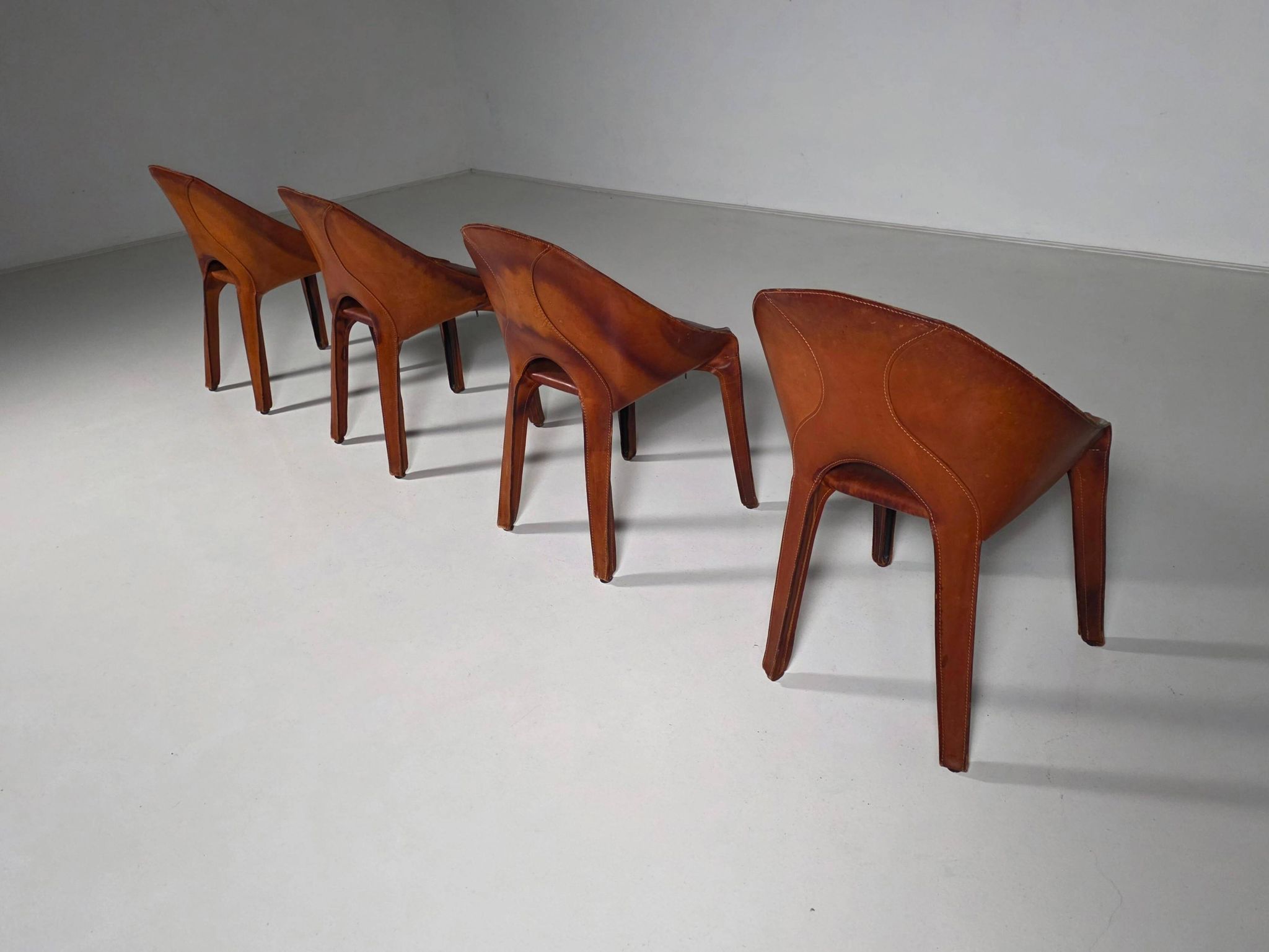 Set of four "Lira e Liuto" chairs by Mario Bellini for Cassina, Italy, 1980s.