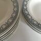 Set de 9 et 6 assiettes en faïence terre de fer de Salins début 20e décor gris vert