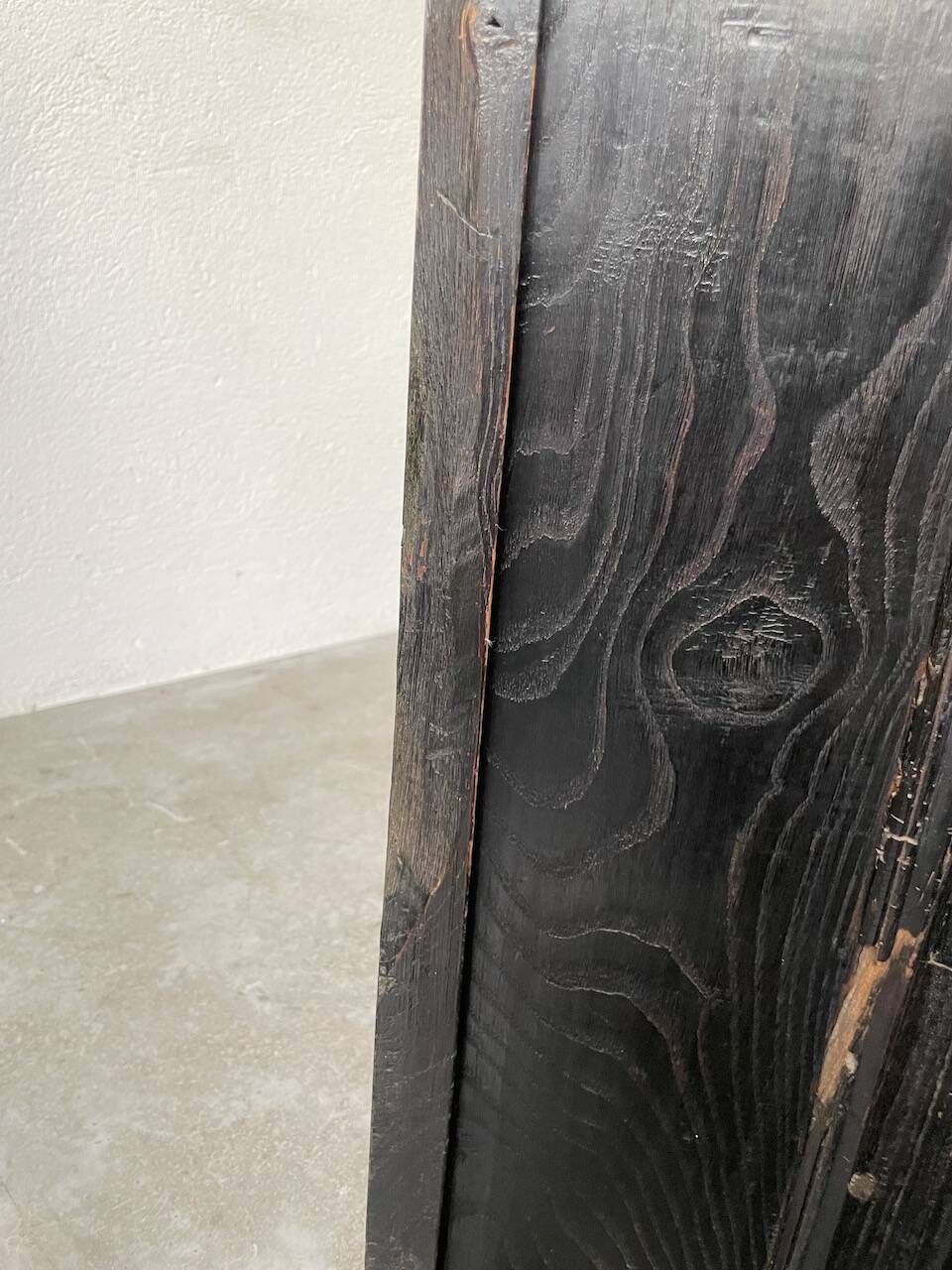19th century chest of drawers in carved blackened pine