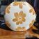 Large vase with golden flowers in ceramic