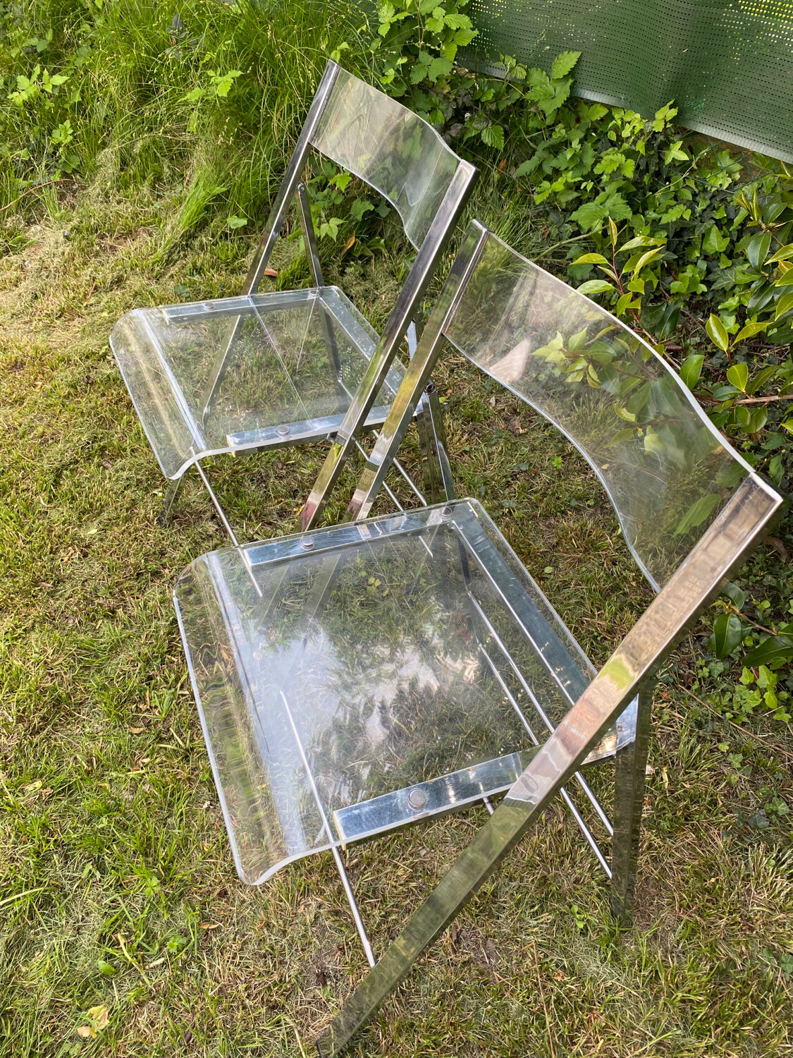 Folding plexiglass chairs