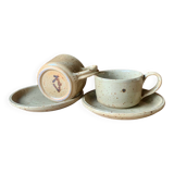 Two large Jean Austruy stoneware cups and saucers
