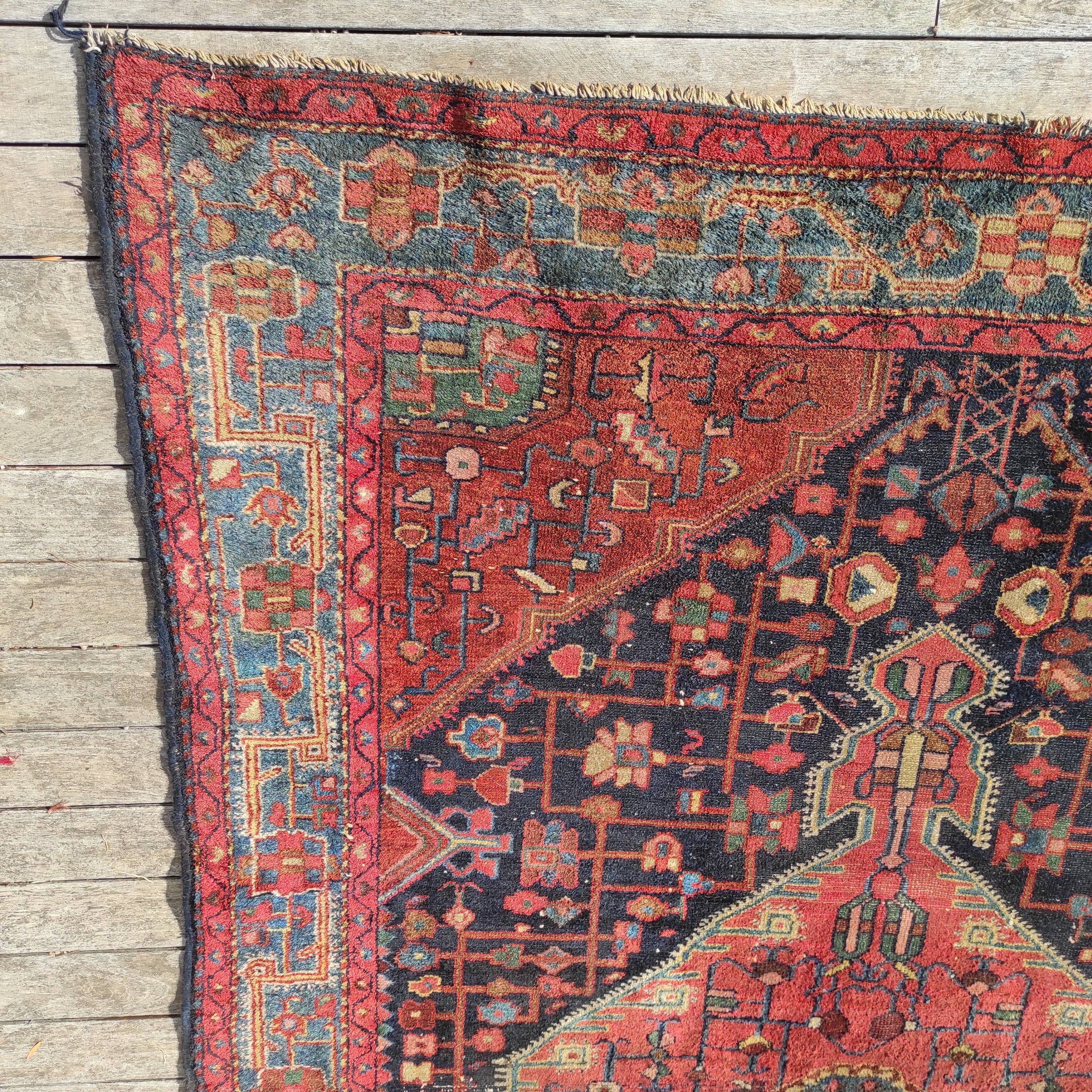 Old Persian carpet 1.62 m wide and 2.33 meters long