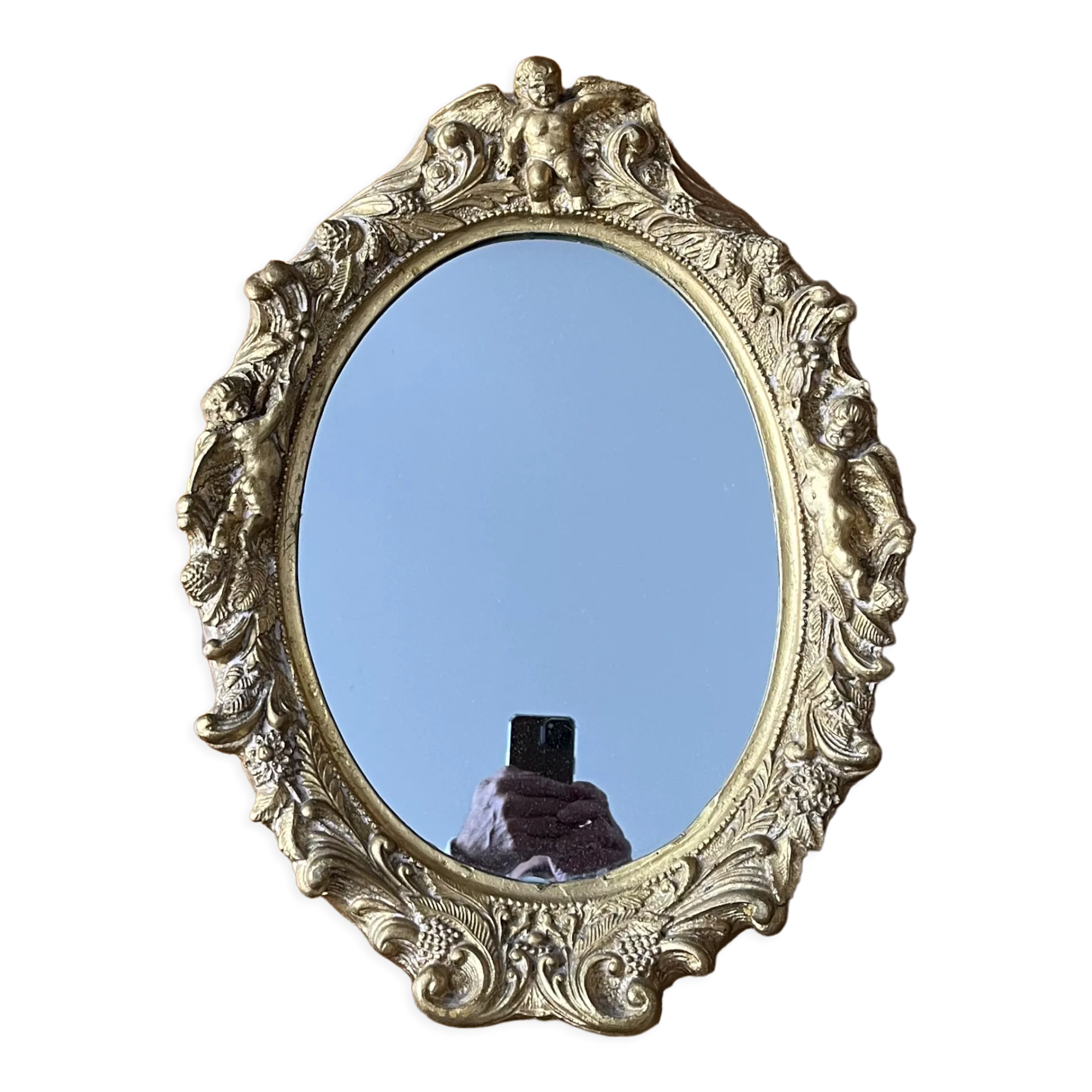 Miroir ovale mouluré doré