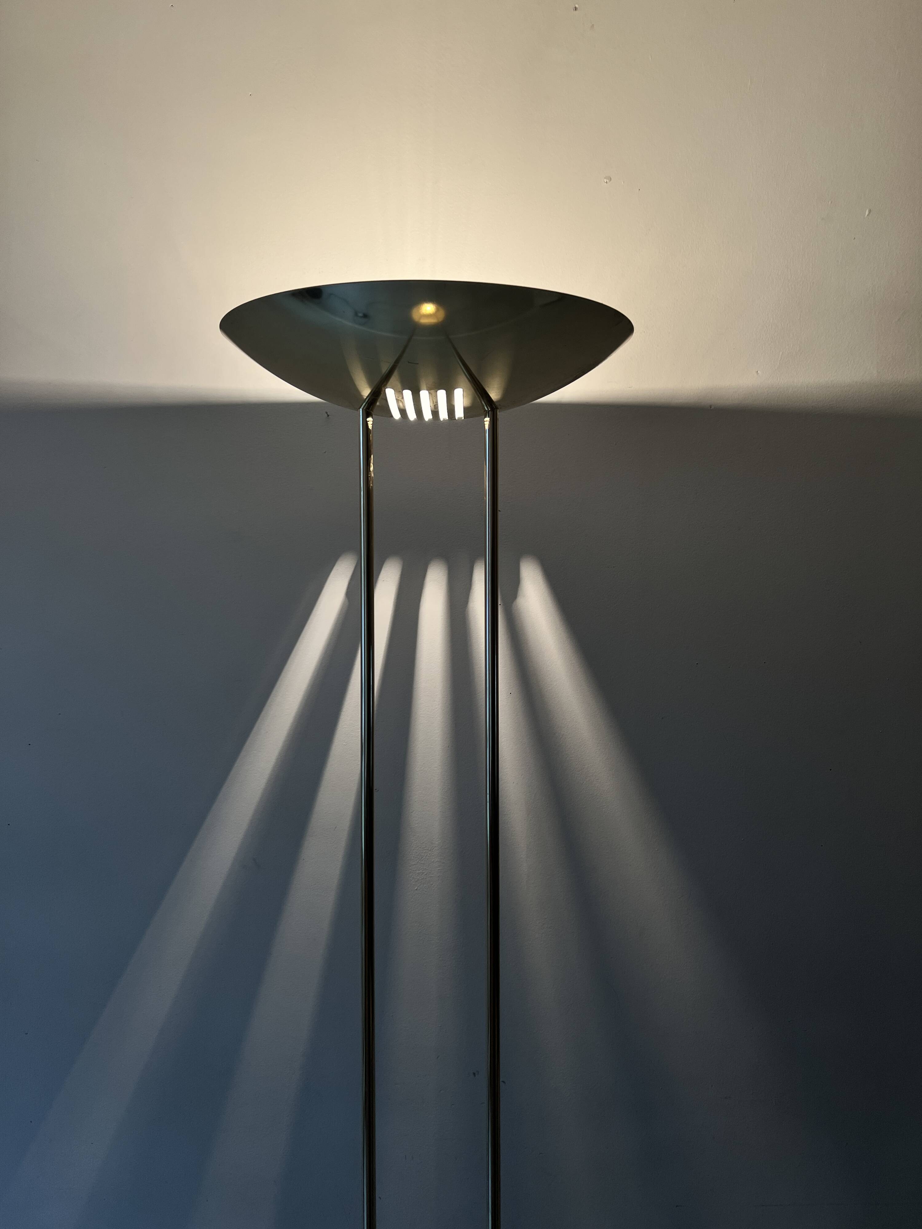 Modernist halogen floor lamp with a gold bowl, 1980.