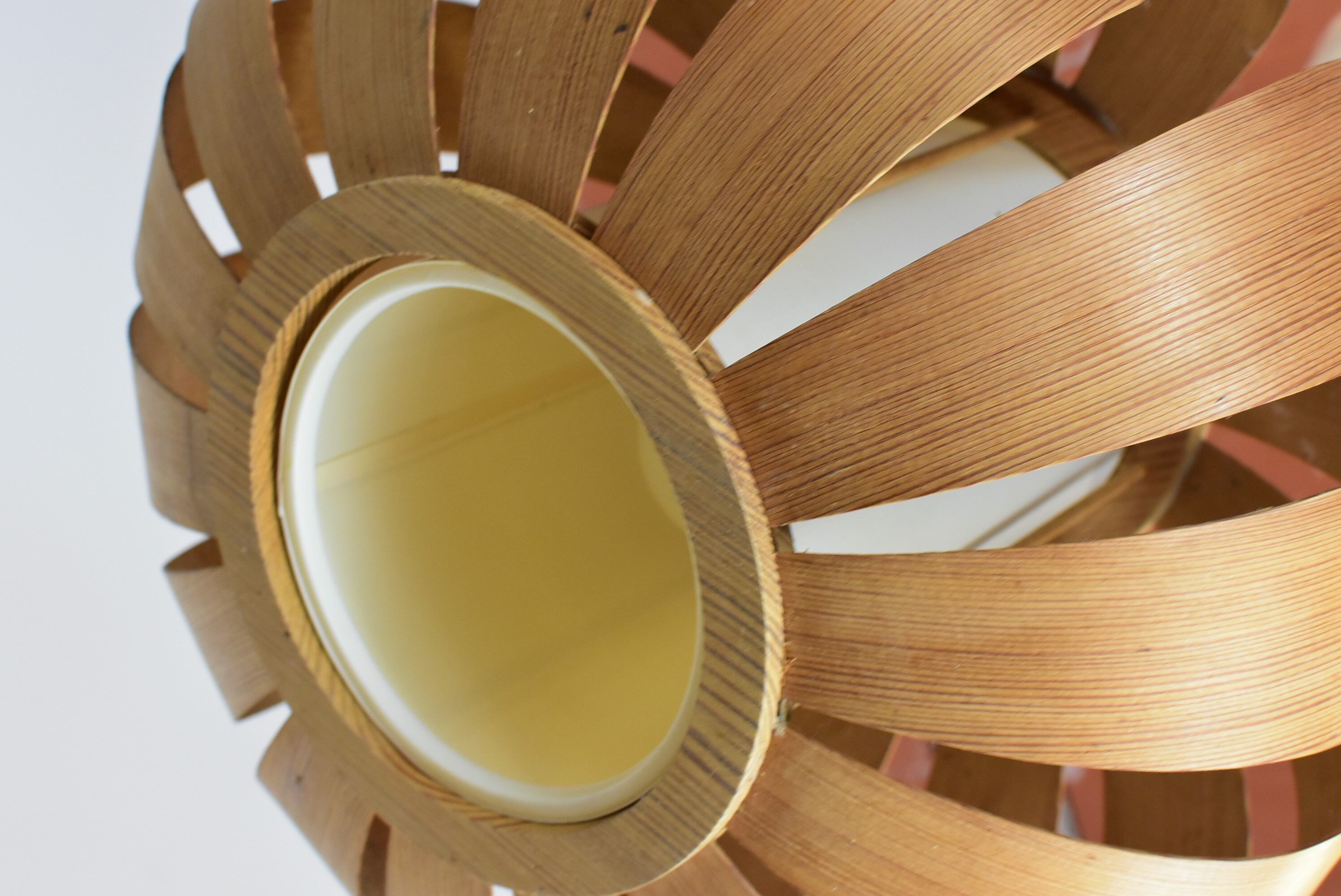 Scandinavian-style wooden pendant light.