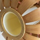 Scandinavian-style wooden pendant light.