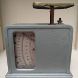 Balance weighs letters