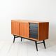 Buffet scandinave en teck avec détails noirs