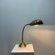French table lamp in brass with a shell-shaped shade from the 1950s.