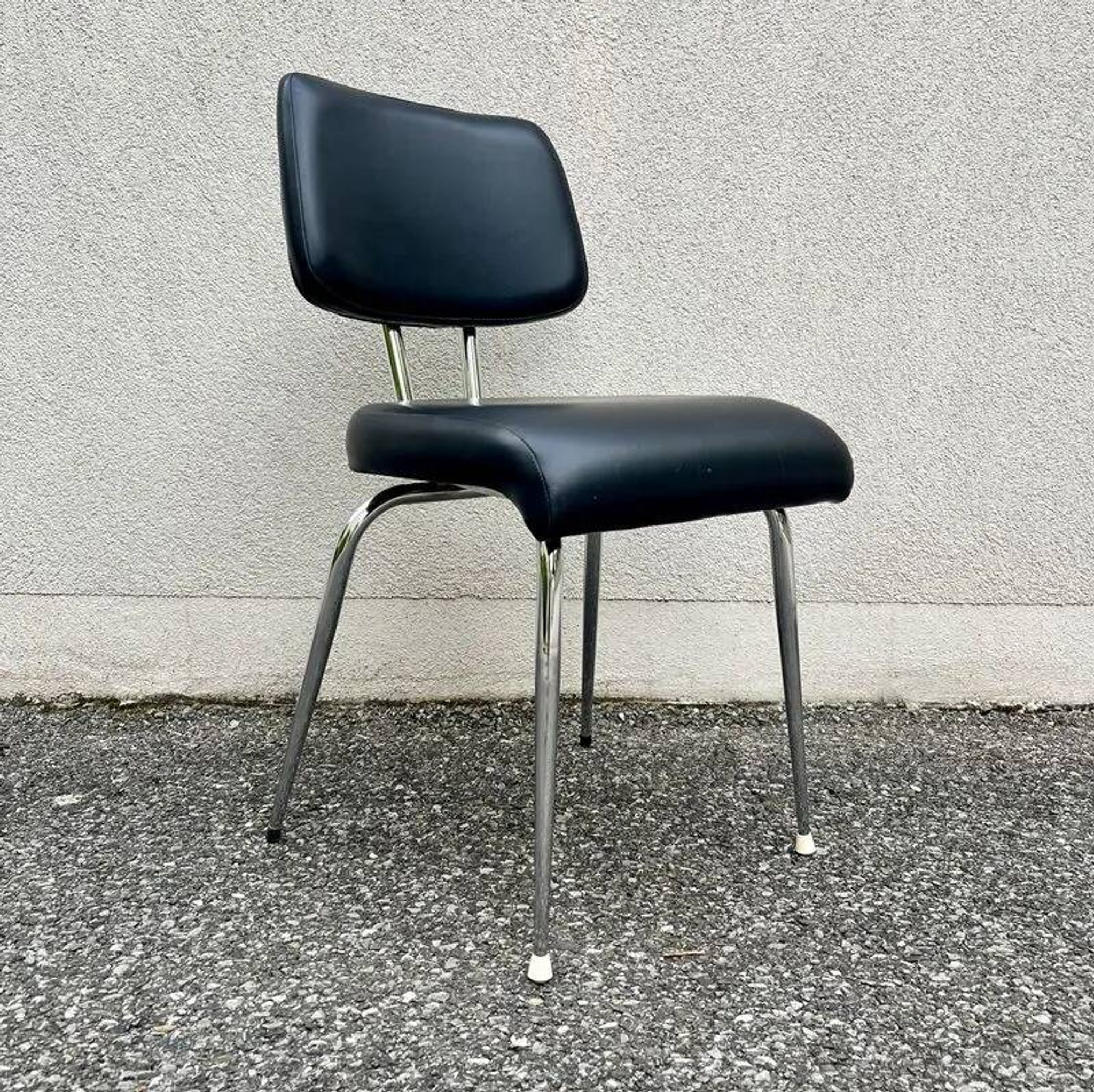 Black faux leather office chair