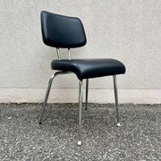 Black faux leather office chair