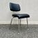 Black faux leather office chair