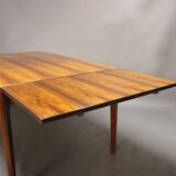 Teak dining table designed by Henning Kjaernulf and manufactured 60 years