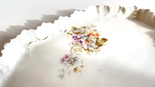 Old tray in floral pattern biscuit